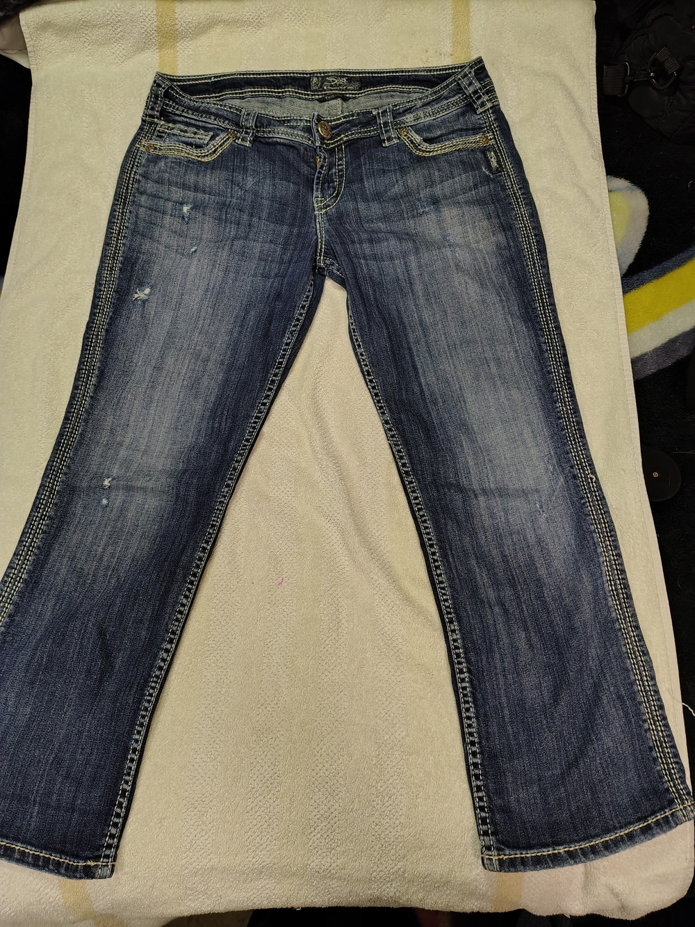 Silver Twisted Capris distressed denim